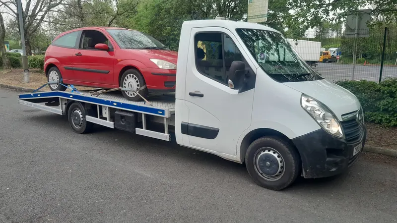 Scrap car bought and loaded onto a recovery truck in Blackpool